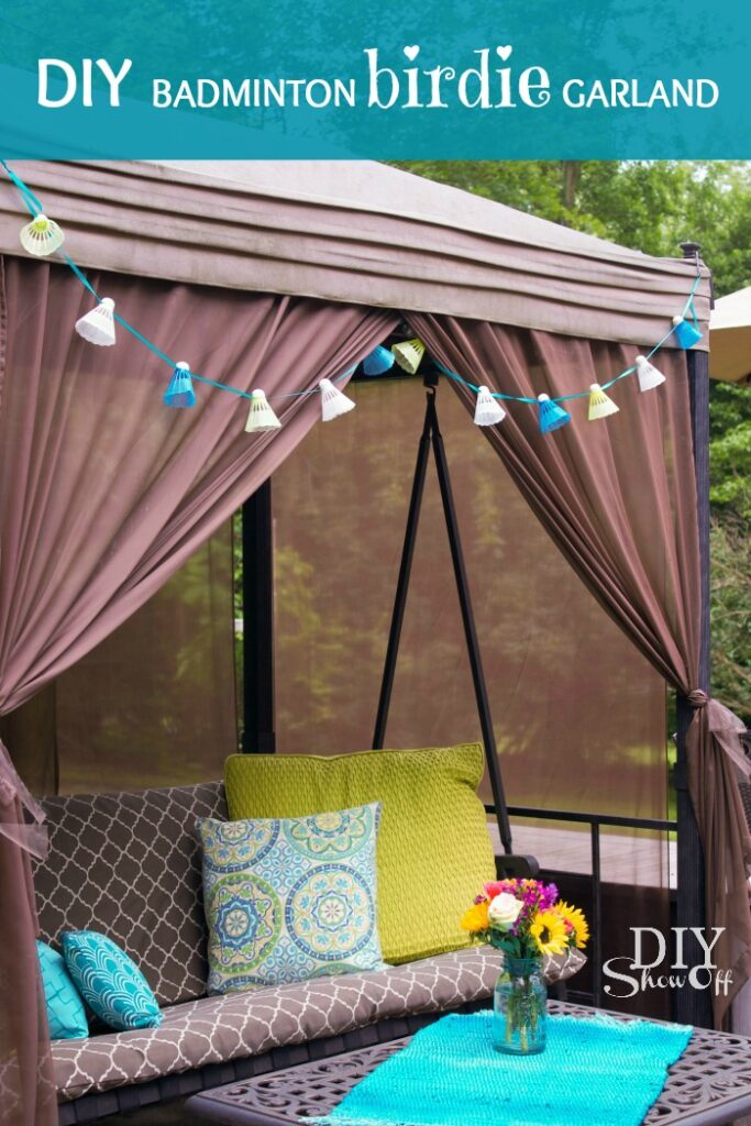 DIY badminton birdie garland hanging on outdoor canopy