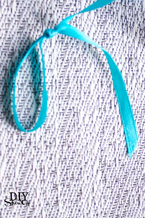 Tying a knot for DIY birdie garland