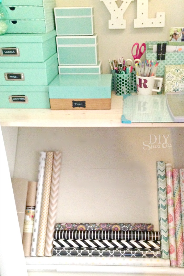 Organization Idea: wrapping paper storage utilizing angled closet floor space! 