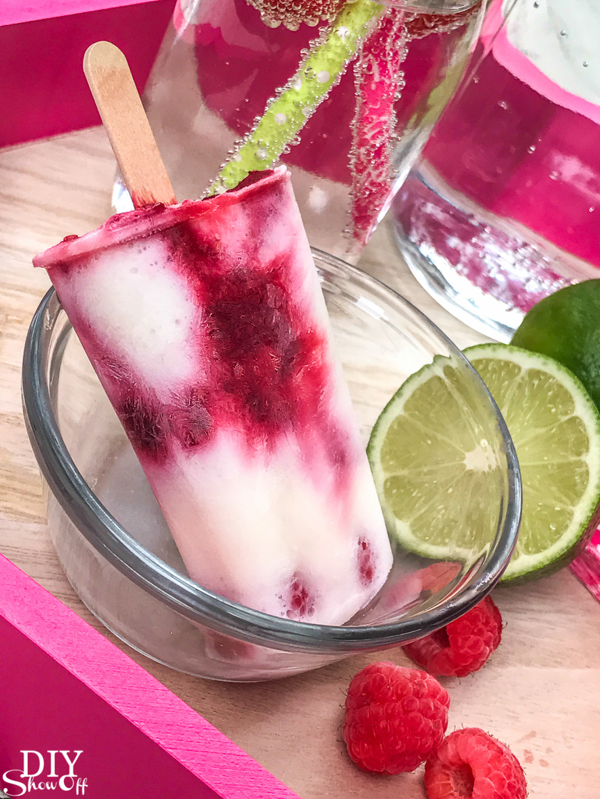 Plan Your Summer Cookout: Raspberry Lime essential oil infused Popsicles recipe @diyshowoff